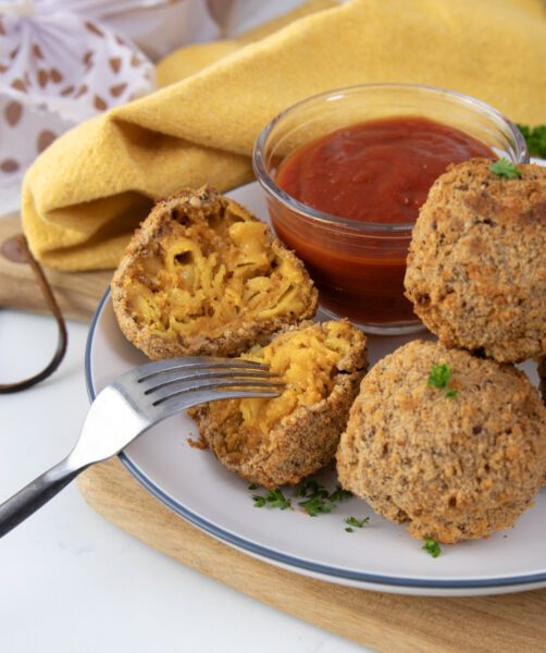 Close-up: High-Protein Vegan Breaded Gluten-Free Air Fryer Mac and Cheese Bites with Marinara Sauce